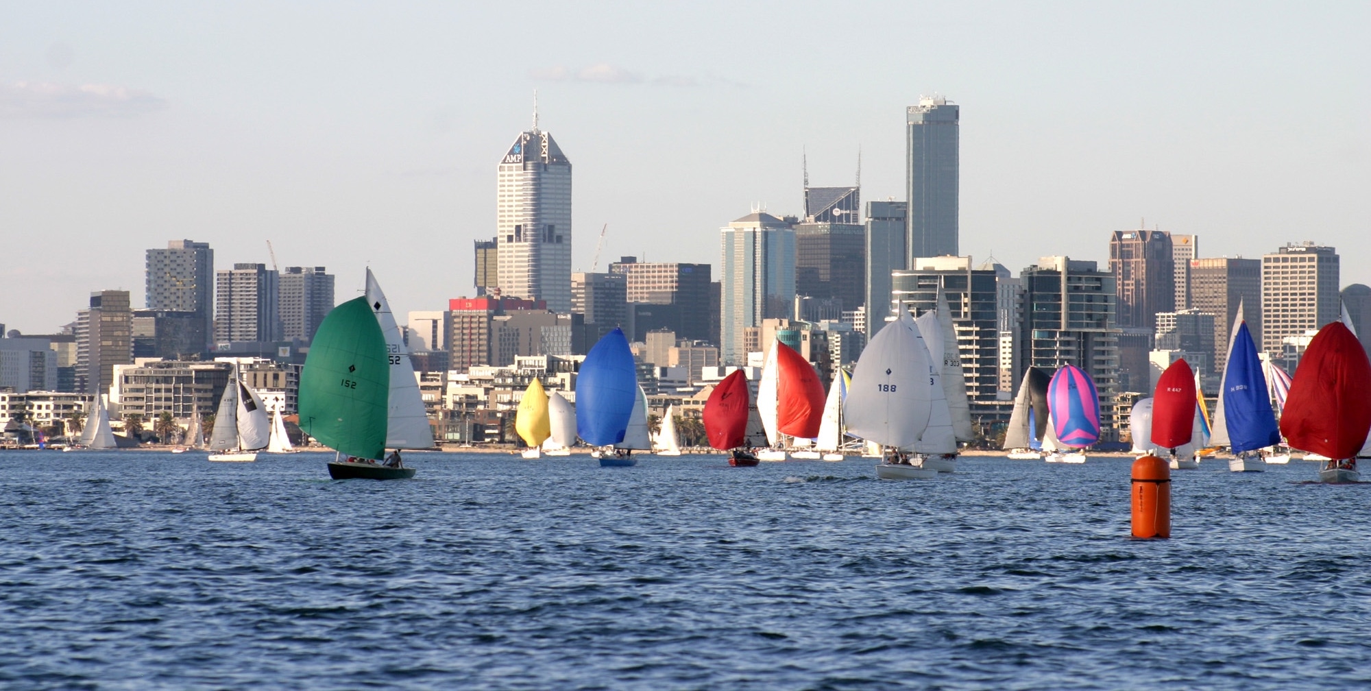 Keelboat twilight with city backdrop